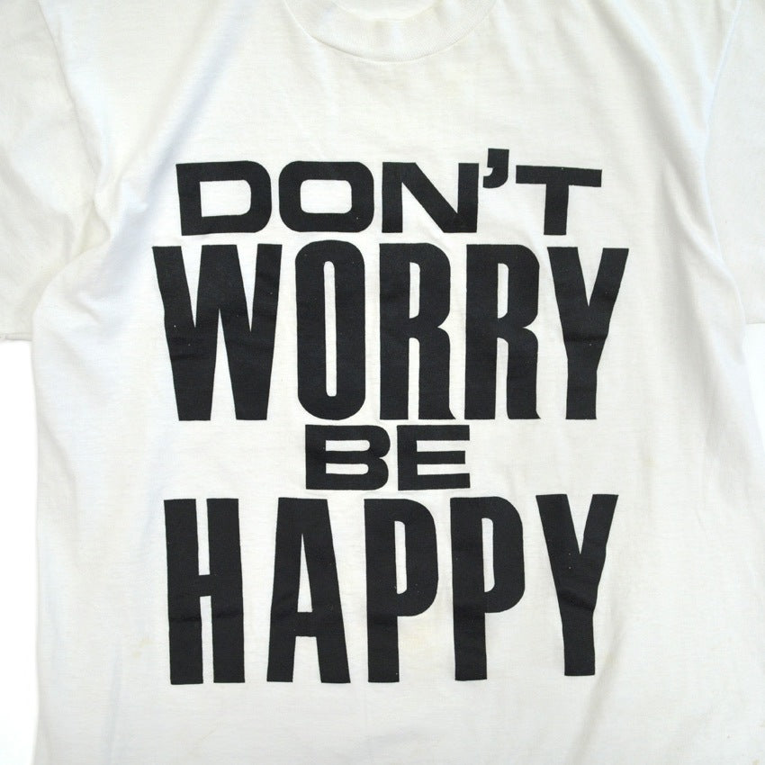 80s-era 'DON'T WORRY BE HAPPY' T-shirt...