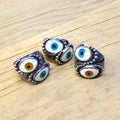 By eyeball silver ring...