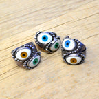 By eyeball silver ring...