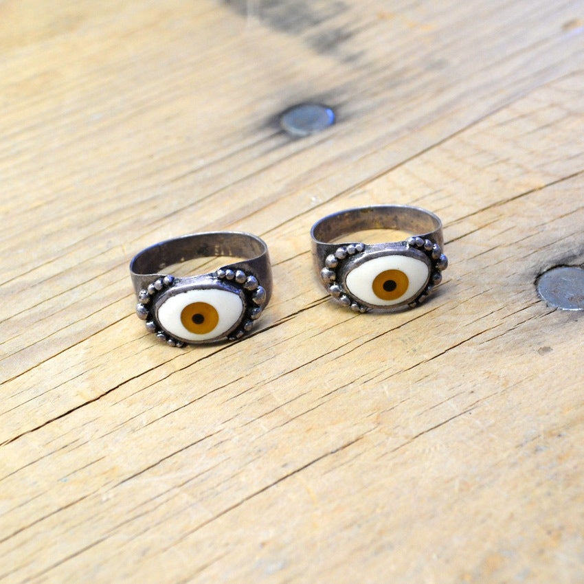 By eyeball silver ring...