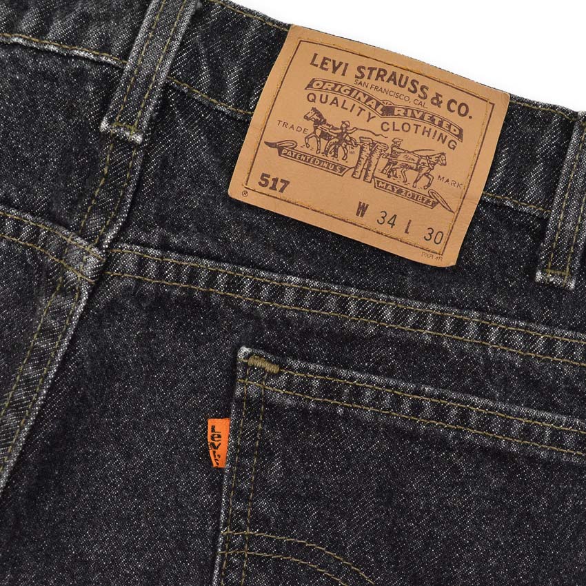 1990's Levi's 517 BLACK DENIM PANTS... W33 L28