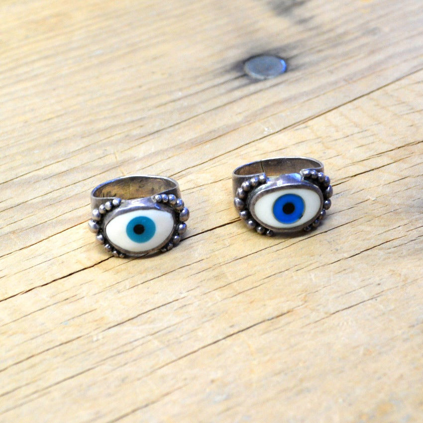 By eyeball silver ring...