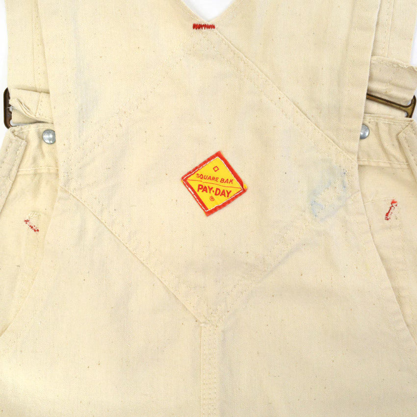 1950s-style PAYDAY PENNEYS off-white overalls with apron...