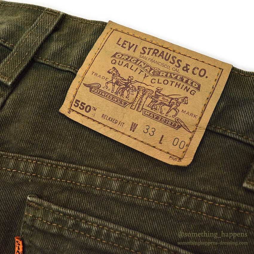 1990's Levi's 550 MOSS GREEN DENIM SHORTS... W33/L00