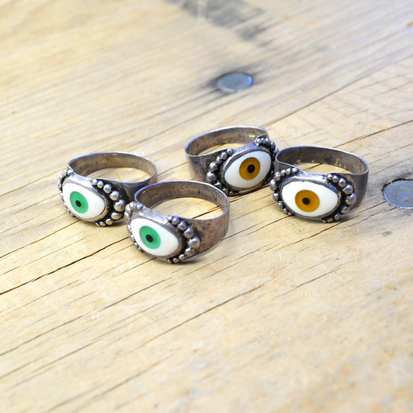 By eyeball silver ring...