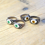 By eyeball silver ring...